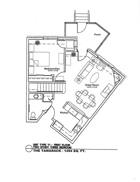A floor plan of a house with a porch, great room, and kitchen.